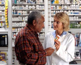 Customer speaking with a pharmacist