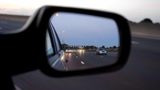 Cars in a rear-view mirror